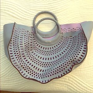 Henri Bendel Perforated semi circle tote